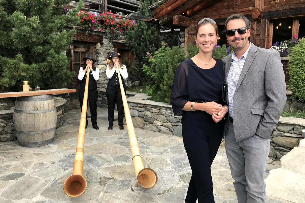 Barry and Sarah Slater, founders of ActiveFusion, at an alphorn welcome in Verbier